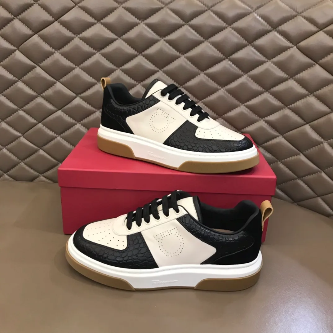 p440 "Salvatore Ferraga**" men's low-top fashion sneakers. This casual shoe has a novel structure and is made of soft calfskin. The contrasting color elements on the upper highlight the bold and avant-garde atmosphere. The first-layer cowhide lining is high-end and comfortable. Energetic and fresh, these shoes can be worn with casual looks or add a touch of street style to elegant trousers.  Size: 38-44